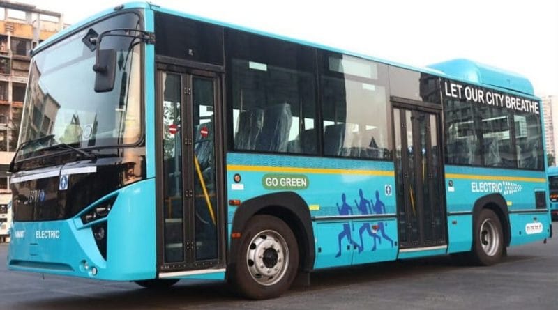 Navi Mumbai NMMT Electric Bus with 'Let Our City Breathe' slogan.