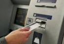 Close up of woman inserting credit card into ATM machine Marathi News