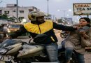 🟢Representative image of a fake bike taxi rider robbing a female passenger mobile phone on a street