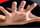 Symbolic image of a hand showing stop gesture against crime